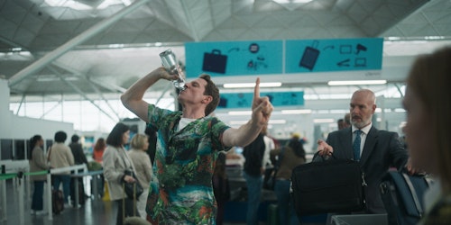 Man drinking a bottle of water Man drinking a bottle of water